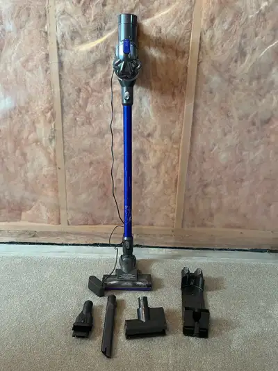 Dyson Upright vacuum cleaner with attachments as shown., View more