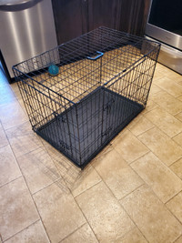 Folding metal dog crate. 36 x 23 x 25 inches. Like new.