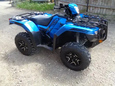 2022 Honda Deluxe auto /electric shift and power steering. Just under 400kms. Quad is in very good c...