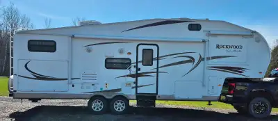 Good condition No soft spots in floor/no leaks Awning in good shape Outdoor kitchen Rear and front s...