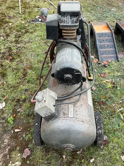 Campbell Hausfeld Two HP, Air Compressor. $65.00.