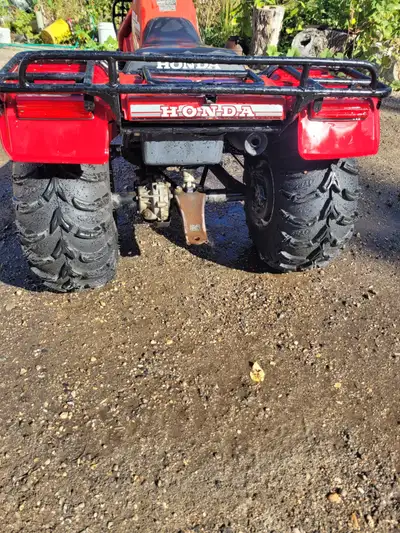 Big Red Honda - very good condition; 5 speed with reverse 250cc; Shaft drive; very good condition $3...