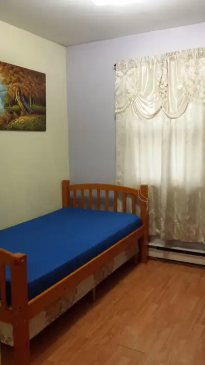 Available: Private Bedroom in a townhouse setting, upper floor. Looking for FEMALE ONLY. Shared acco...