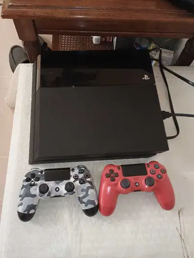 Sony PlayStation 4 with 2 Controllers, View more