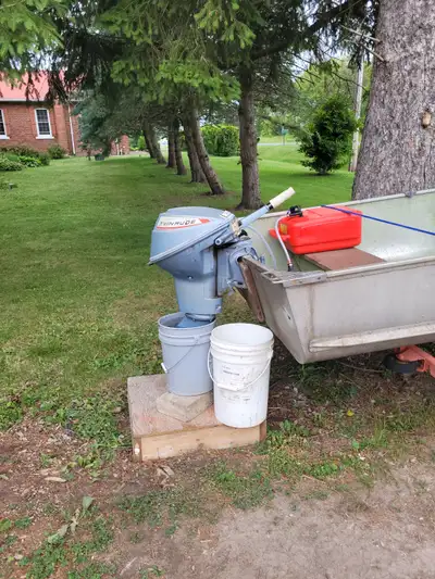 FOR SALE $1200 or obo 14 FT Aluminum Fishing BOAT made in Canada (no leaks or holes), 9.5hp Evinrude...