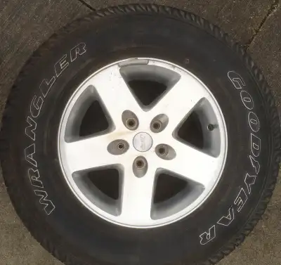 Like new, Jeep spare tire, P255/75/R17. Came from a Jeep Wrangler. On Jeep Rims. $250 OBO
