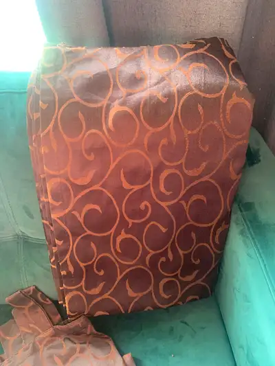 Set of 2 brown tab top panels Approx 220cm long x 135 wide each panel Back is sun faded otherwise in...
