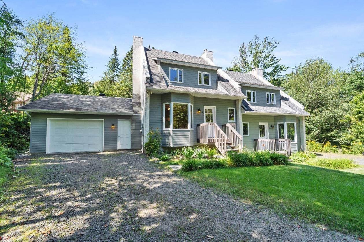 DUPLEX AVEC GARAGE A VENDRE A SAINT- SAUVEUR — photo 2