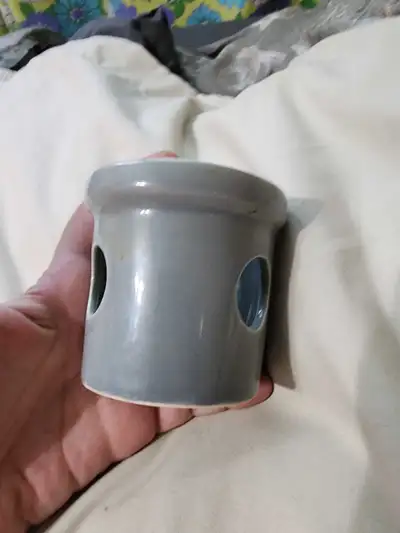 Enhance your space with this ceramic aroma oil diffuser. This item shows signs of use. Simply add yo...