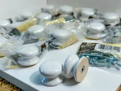Worth over $150, this set of porcelain knobs is in excellent, like new condition and includes the re...