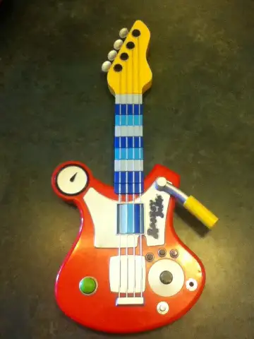 In excellent, with strap (not shown) Minature replicat of guitar Rooney Doodle jams on About 18inche...