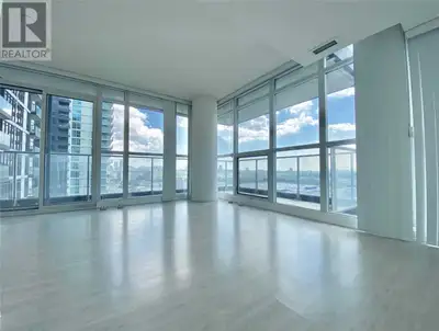Freshly Painted & Ready To Move-In! Spacious Open-Concept Corner Suite. Sun-Filled Floor To Ceiling...
