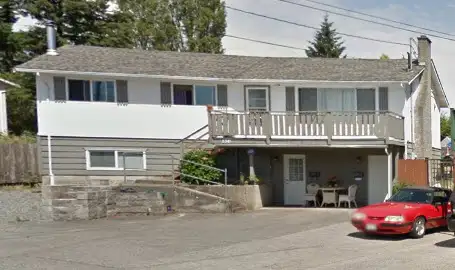 Lovely main level walkout legal suite with 2 large bedrooms and 1 bathroom with own front loading wa...