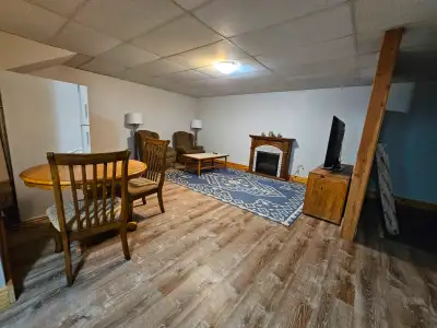 Room with private livingroom, den, fridge and bath for rent