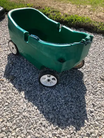 $20 for 2 seats kid’s children green wagon Plus has 2 cups holders and string already tie to pull ve...