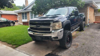 2008 chevy2500 diesel 6.6 with 6.5 pro comp lift sell for 16k 