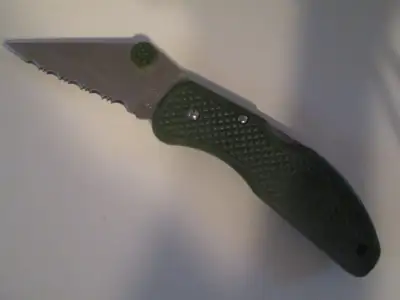 Greenhawk knife with blade lock and belt clip, View more