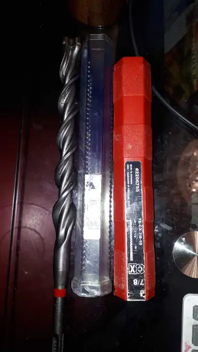 This is a used Hilti TE-CX 7/8 inch drill bit, perfect for heavy-duty drilling into concrete and mas...