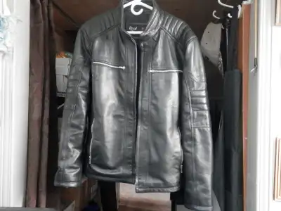Real Leather Jacket for sale.Size Large,Only worn once to a store ,but Arms are too long for me.Spra...