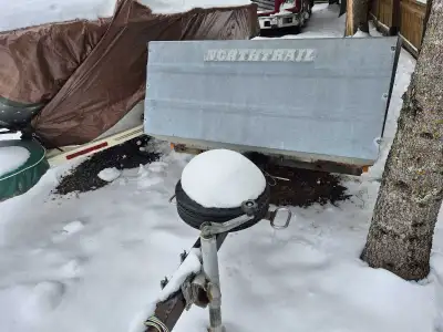 Single snowmobile trailer for sale with double lock tilting with spare tire, as the pictures shows,...