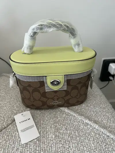 Brandnew authentic with strap