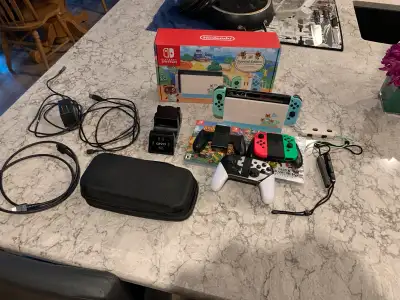 Comes in original box with all original cords, joycons dock and console. Comes with the games Super...
