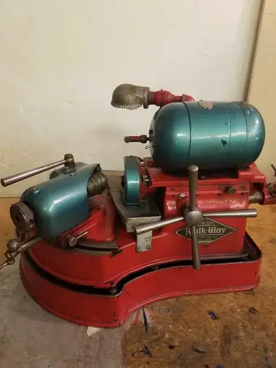Please list the following : Kwik Way valve grinder c/ w, new grinding wheel, grinding fluid pump, ro...