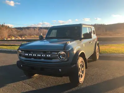 Manual, 1 (original) female owner, not yet 4 yrs old (in Nov 2025), warranty to $100,000, (roof & do...