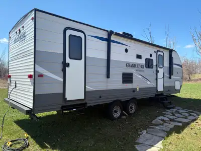I'm selling a 2019 Grand River Bunkhouse Ultralight, a lightweight travel trailer perfect for family...