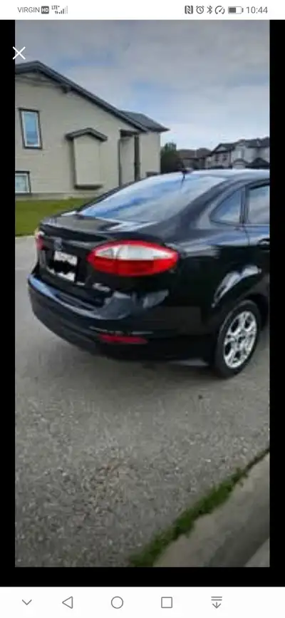 2015 Ford fiesta sedan. Active status. 1.6L engine. Very good on gas. Engine and transmission 100% o...