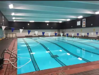 You: Young Asian Canadian at the pool. Helping a boy who is on the spectrum. Me: just sitting on the...