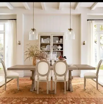 lovely farmhouse dining chairs! These chairs feature a weathered wood frame and a comfortable uphols...