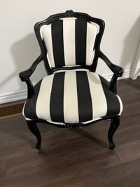 Set of black and white striped chairs