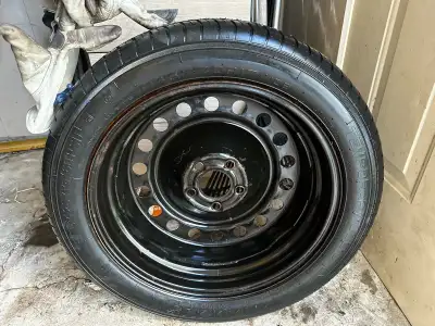 This is a T145/70R17 106M temporary spare tire, ideal for compact vehicles needing a reliable emerge...