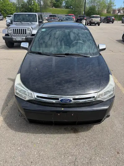 This black 2008 Ford Focus is ready to drive you around town. This used sedan is in good condition a...