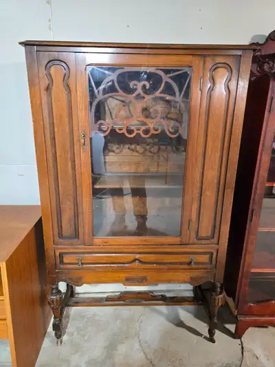 Jacobian style walnut china cabinet 1930s, View more