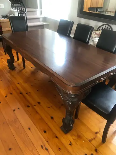 A one-of-a-kind dining table handcrafted from an authentic antique Heintzman & Co. grand piano. This...