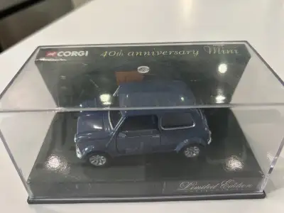 Relive the nostalgia with this Corgi 40th Anniversary Mini, a delightful diecast model that captures...