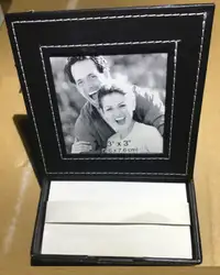 Small black leather note pad with photo