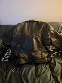 Bikers coat, custom made in Vancouver BC. Weighs 15-20lbs.
