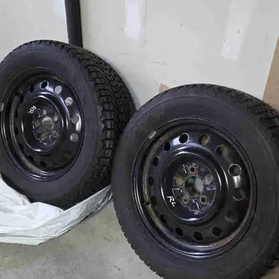TWO 17 inch Firestone Winterforce snow tires and rims for sale. Plenty of thread left. TWO 17 inch D...