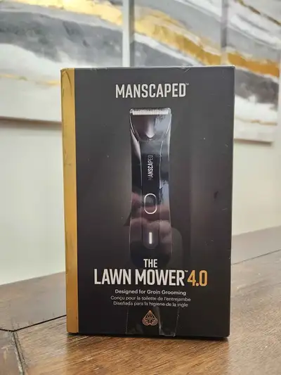 Selling a Manscaped The Lawn Mower 4.0 electric trimmer. This is an open-box item—the packaging has...