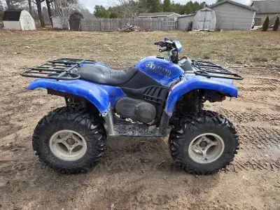 Yamaha grizzly 660 with papers works good but starting to smoke just put a new axle and ball joint i...