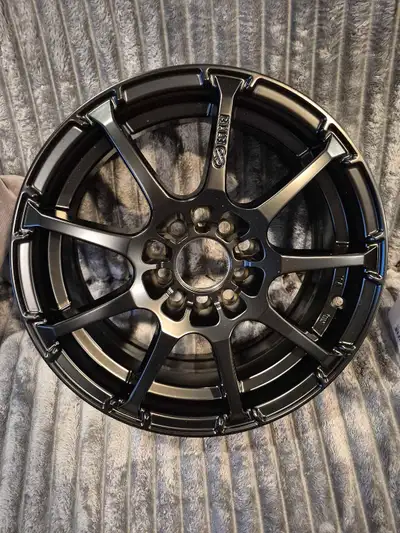 Up for sale is a set of four brand new Enkei EDR9 black alloy rims, sized at 15 inches with a 5-100/...