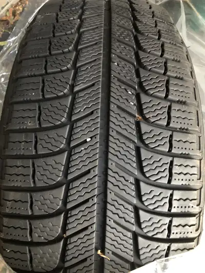 Set of 4 Michelin X-Ice snow tires. They have 7/32 treat remaining. The come with 10/32 new and new...