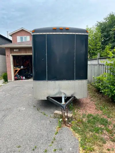 Jensen trailer for sale. 12' long. 8' high. 6' wide (inside wall to wall) New leaf springs on both s...