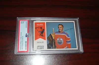 Jacques Plante 1974 OPC WHA #64 PSA 7 Beauty Card Lifetime Stats, View more