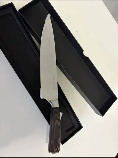 This Triple Tree Premium Stainless Steel Chef Knife is in new condition, still housed in its origina...