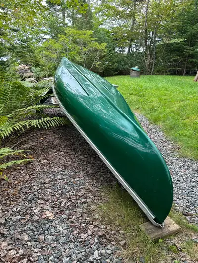 Fiberglass canoe (2-person carry) 12-inch depth 16-foot length 60-pound weight Made in Canada