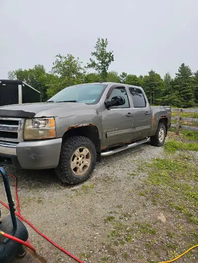 2009 Chevrolet Silverado 4x4. Still runs. Engine and Transmission good. Tires like new LT265/70R17